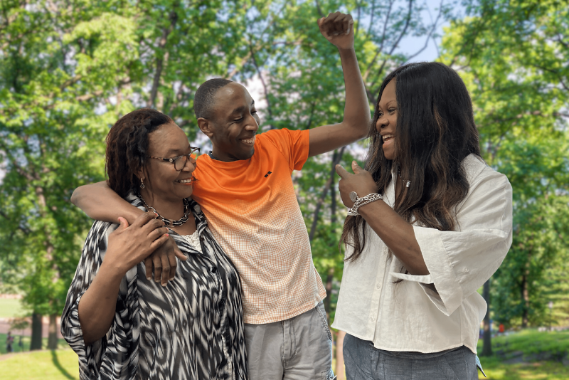 mom, son, care manager all happy and lauging